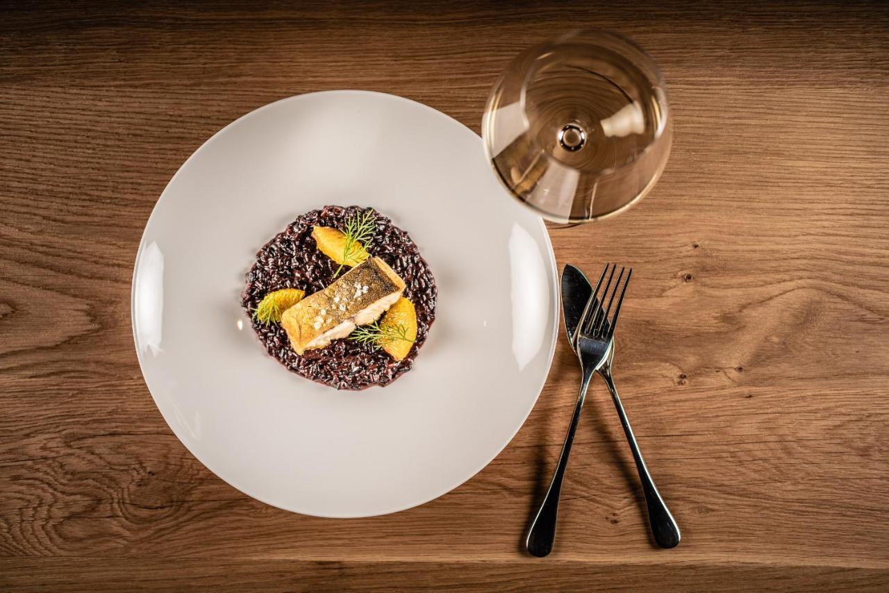 Hotel My Arbor - Dolomites Bresanona Exterior foto A plate of black rice risotto